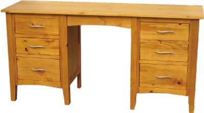 This lightly waxed pine double pedestal dressing table has 6 dovetailed drawers and stylish wave