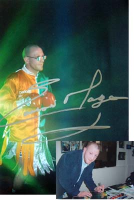 A superb A4 colour photo of the Irish fighter Eamonn Magee, which he has signed in silver across the