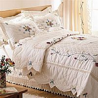 Luxury quilted duvet cover with crochet detail. Co