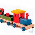 Charming train with four carriages holding blocks