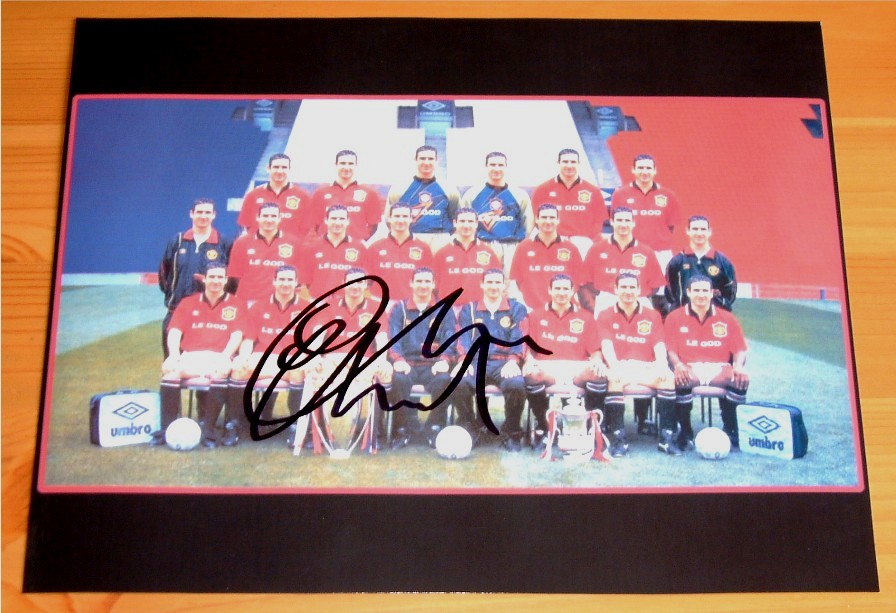 Eric Cantona has signed this superb photo in black pen. The picture shows the Manchester United