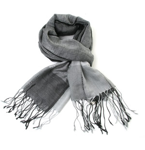 Light weight scarf with all over large check print and long tasseled fringe detail. The Esabrina sca