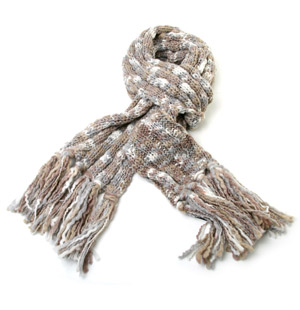 Knitted scarf with neutral multi-colour tones. The Esam scarf has chunky tassels and will add a dash