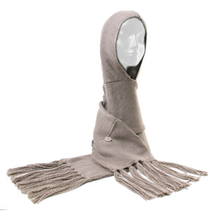Knitted hooded scarf featuring pockets with button and fringing detail. Wrap yourself warm this wint