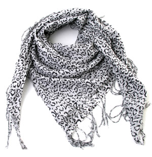 Cotton scarf with all over leopard print and fringing detail. The Esophie scarf will keep you right 