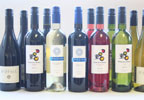 Twelve bottles of superb red and white wines await your consumption. Enjoy with food or simply to to