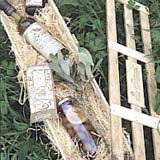 Send a beautiful potted olive tree with a jar of extra olives deliciously marinated in herb infused extra virgin olive oil, and a delicious bottle of organic olive oil. This all comes beautifully presented in a rustic wooden crate, lined with brown w