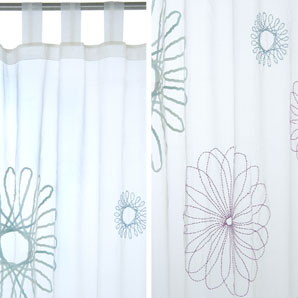 A sheer, cream silk panel with "spirograph" style circular coloured designs in beads and ribbons