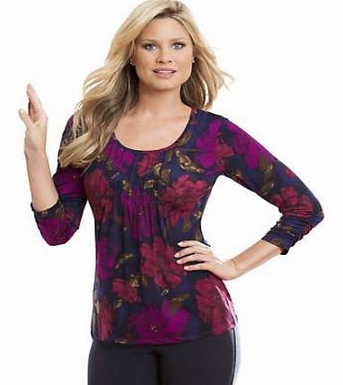 Versatile jersey top with a lavish floral print. Fine piping runs from the rounded neckline, over the bust and allows the fabric to fall loosely. The three-quarter length sleeves are slightly gathered at the cuff. Fair Lady Top Features: Flattering f