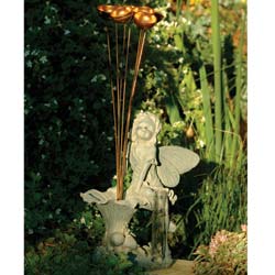 When its raining in the garden, this pretty ornament really comes into its own. The brass bells