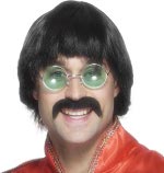 Excludes glasses and tache.