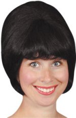 Black sixties style beehive wig, ideal accessory for mod girls and sixties popstars.