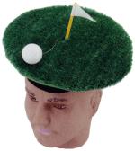 Novelty hat in shape of putting green with ball and flag.