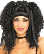 Curly black wig with short straight cut fringe.