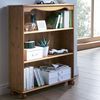 This traditional style farmhouse bookcase in solid Scandinavian pine with stylish bun feet is the pe