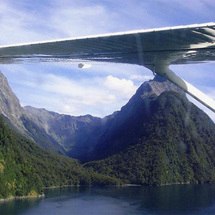 Soar over the spectacular Mount Aspiring and Fiordland World Heritage National Parks and experience 