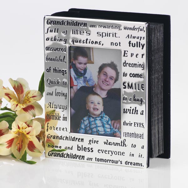 A beautiful silver plated photo album. A superb gift for grandparents especially if its filled with