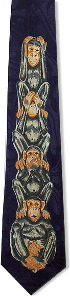 A fun tie with the well known three See No Evil monkeys on a dark yellow background, with an