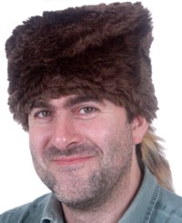 Davy Crockett style hat with a racoon tail. Perfect for tracking through the wild frontier