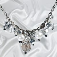 Large glass beads and faux pearls adorn this 46cm (18&quote;) chain. For jewellery returns please