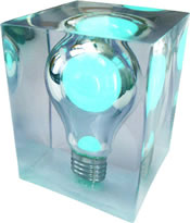 Light Bulb set in a clear solid brick. Recharges from energy in natural light during the day -