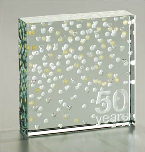 This wonderful glass keepsake has the message 50  Years within a heart design and comes in a luxury 