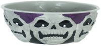 A large bowl decorated with a skull pattern ideal for holding sweets at Halloween for Treat or