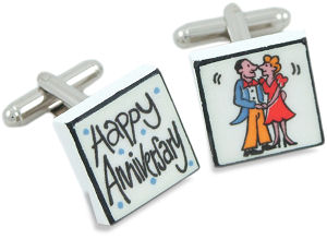 A wonderful pair of cufflinks featuring the words Happy Anniversary on one and a picture of a couple