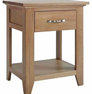 Give your lamps a new home with this beautiful solid oak and oak veneer single drawer lamp table. The table features a single brushed stainless steel handle and is constructed with high quality dovetail joints. Part of the Harvey collection. Size H59