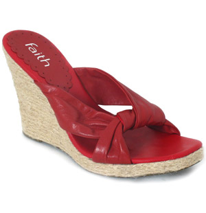Leather mule sandal with high raffia wedge and knotted vamp detail. The Havina shoe is ideal both fo