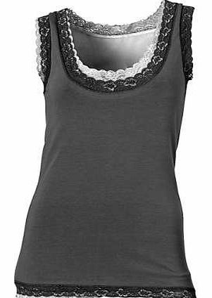 Perfect for layering - sleeveless top with lace trim on the neckline, arm holes and hem. Pack contains 1 black and 1 white top. Heine Top Features: Pack of 2 Washable 95% Cotton, 5% Elastane Lace: 90% Polyamide, 10% Elastane Length approx. 64 cm (25 