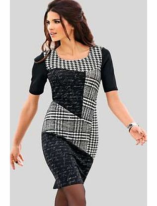 That coveted chic and simple aesthetic is simple to achieve with this shift dress. In patchwork design with plain black short sleeves and back. Perfect from day to evening.Heine Dress Features: Washable 95% Polyester, 5% Elastane Length approx. 94 cm
