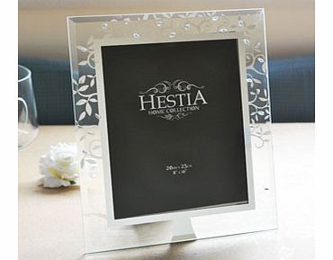 This simply designed but stunning affect Hestia Glass Leaf and Crystal 8 x 10 Photo Frame will beautifully display any picture or photo of your choice.The outside of the photo frame has been made from glass and featured within in mirrored glass is a 