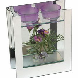 This Hestia Mirror Purple Flowers Double Tea Light Holder makes a wonderful gift for a special lady that is perfect for giving on any occasion.This piece has two rectangular pieces of mirrored glass that in the centre is clear so that in between the 