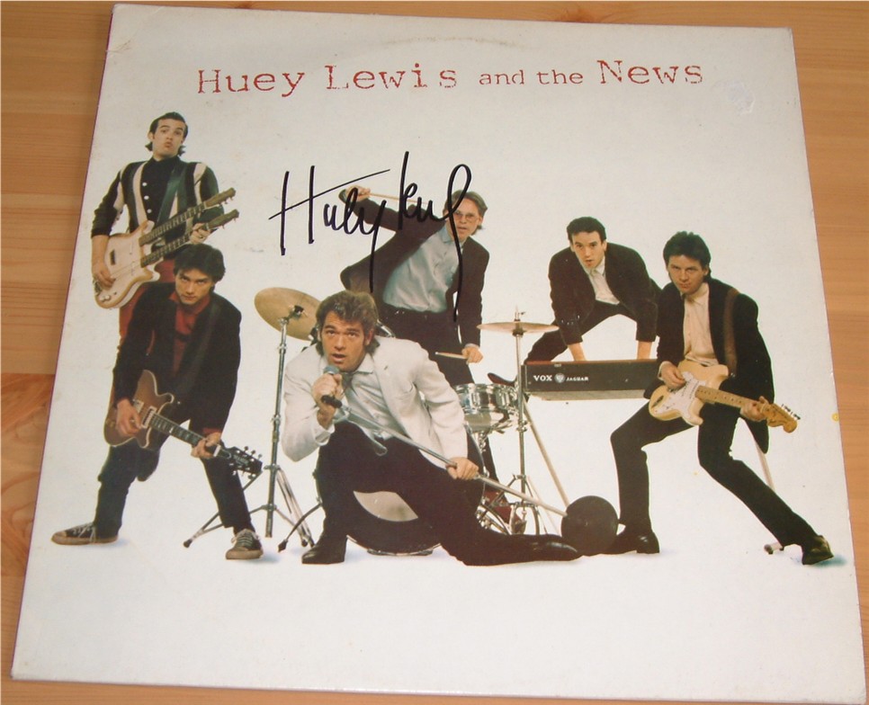 Signed in black pen by bands frontman Huey Lewis. Record still present. COA - 0200000441