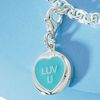 Blue enamel and silver `I Luv U` charm with locster clasp.