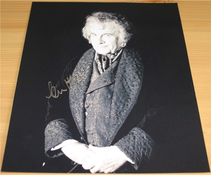 Superb signed photo of Ian Holm - Bilbo in Lord of the Rings. Signed in silver pen. COA -