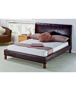 Chocolate coloured faux leather and wooden feet. Includes luxury firm mattress. Overall size