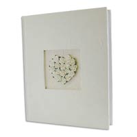 Beautifully bound in handmade paper with a heart m