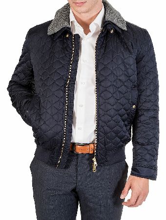 J. Lindeberg Kev Peached Quilt Jacket is a luxuriously stylish design that is sure to keep your attire fresh and comfortable. The garment features a two way open-ended zipper a ribbed hem and collar a small buckle on the collars front slanted hand po