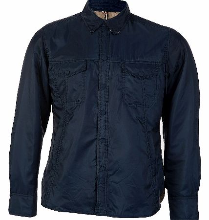 J. Linderberg Navy Lawler 42 Feather Nylon Jacket Ultra-light shirt/jacket that comes with a 40 gr padding for a light insulation that makes it perfect to wear in the evenings. - contrast details under collar pocket flaps and cuffs - tone in tone pre