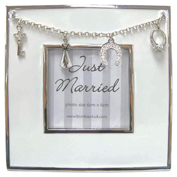 Contemporary and cool way to display that cherished wedding shot in this gorgeous Just Married charm