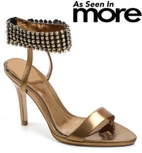 Metallic leather sandal featuring a high stiletto heel and buckled ankle cuff featuring all over met