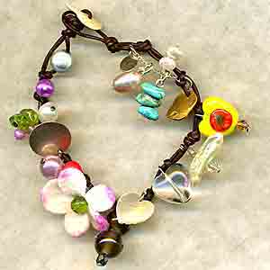 Lapdog Handmade Designer Jewellery; `Little Yellow Heart` Charm Bracelet on a leather cord,