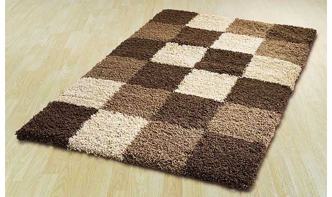 Warming blends of natural and chocolate shades add texture and depth to this Norvik block rug. The fluffy tactile rug has a friendly appeal. It is also easy-care and hard wearing. 100% polypropylene. Sponge clean only. Size L230. W160cm.
