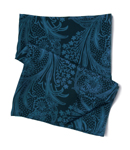 This long, wide scarf is made from pure silk and features the prettiest floral print in kingfisher b