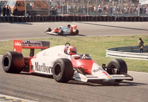 Lauda McLaren MP4/2B #1 with Prost chasing Photo (20cm x 30cm)