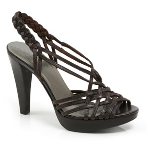 Gorgeous leather sandal with a high stack heel and platform. Featuring strappy vamp, slingback and s