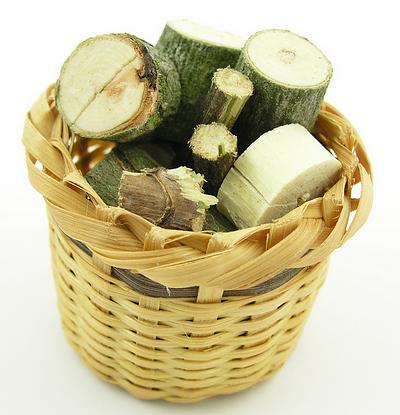 Logs in Whicker Basket