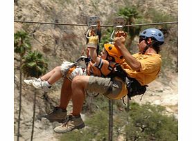 Feel the incredible adrenaline rush of flying as you zoom through cliffs and canyons at over 300 feet in the air on this zip-lining adventure.